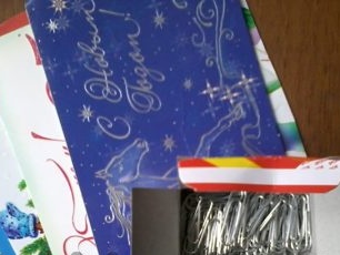 paper clips and postcards for the manufacture of curtains