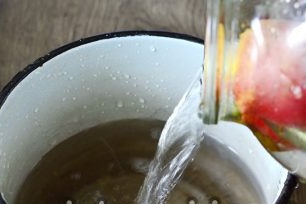 pour the water into the pan