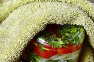 pour boiling marinade into jars and immediately roll them, turn and wrap