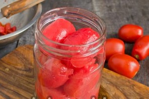 put tomatoes in jars