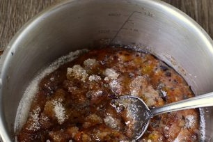 mix plums with sugar