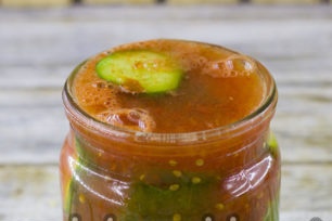 pour cucumbers with tomato
