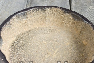 grease the form, sprinkle with breadcrumbs