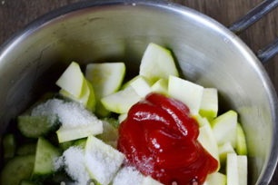 add salt, sugar, ketchup to vegetables