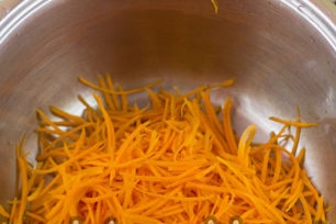 grated carrots in a bowl
