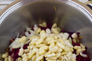 add beans and simmer vegetables
