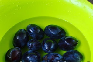 Wash the plums well