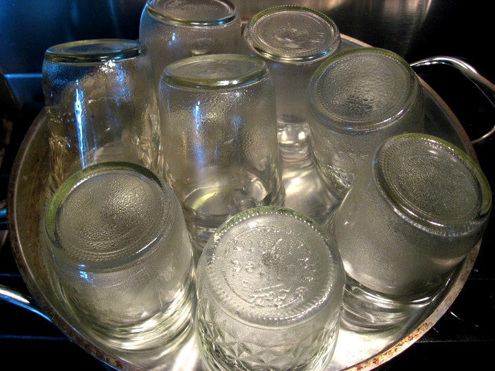 Sterilizing cans in a pan