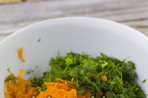 grate carrots, cut greens