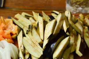 cut eggplant, onion, pepper