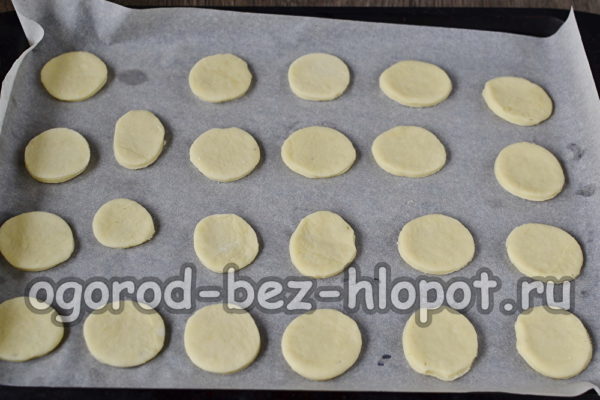 put cookies on a baking sheet