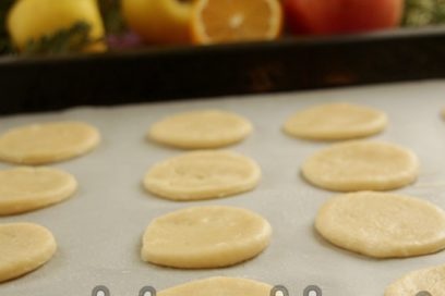 put cookies on a baking sheet