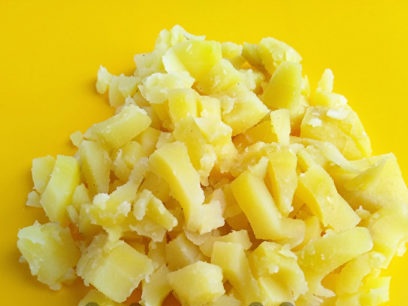 boil the potatoes, peel and chop