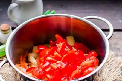 put vegetables in a pan