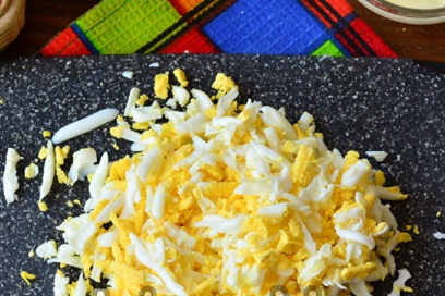boil eggs and grate