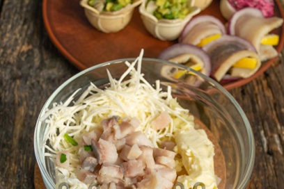mix potatoes, eggs, herring, butter, cheese