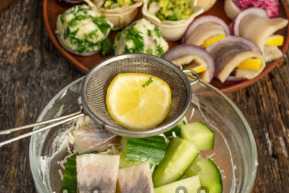 mix eggs, cucumber, herring, cheese, lemon juice