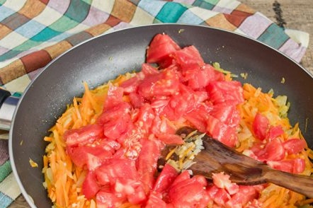 adding tomato