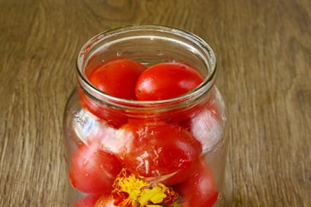we put tomatoes and marigolds in a jar