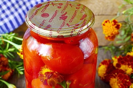 jar of tomato with flowers