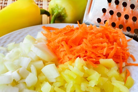 chop onions, peppers and carrots