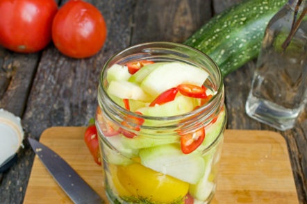 fill the jar with vegetables