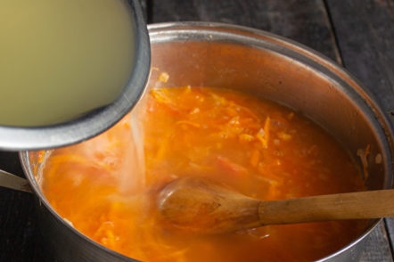 add broth to vegetables