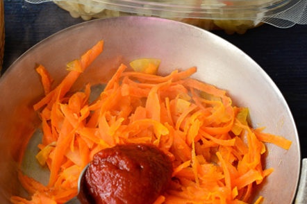 add tomato paste to carrots
