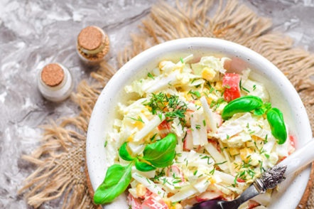 salad of crab sticks of corn and cabbage